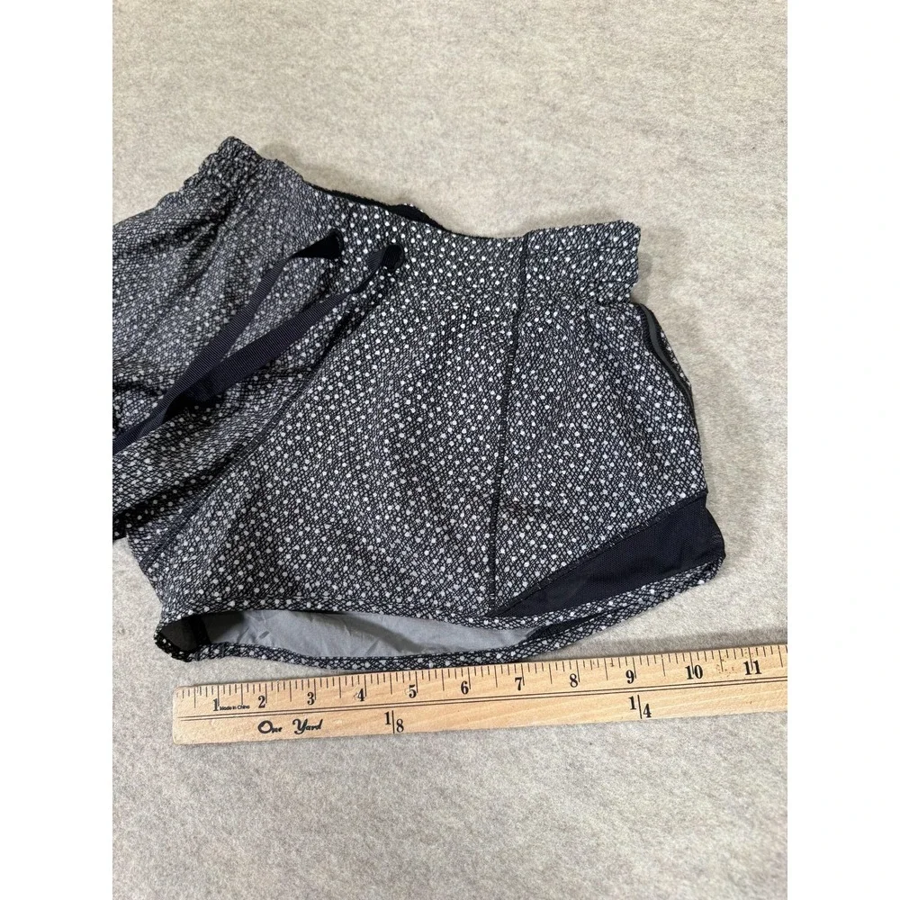 Lululemon Running Shorts Womens 4 Black Lined Zip Pocket Split‎ Hem Athletic